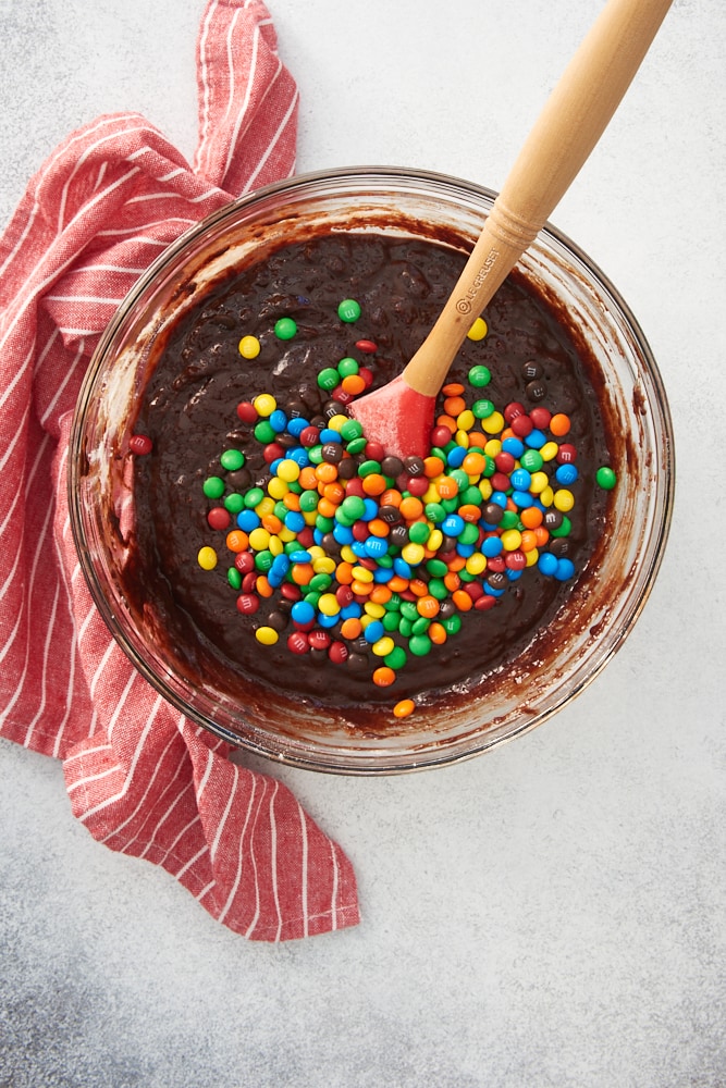overhead view of the batter for M&M Brownie Bites