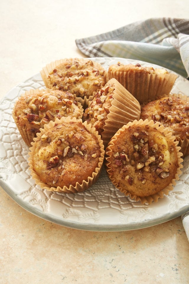 Banana Cream Cheese Muffins on a patterned white plate