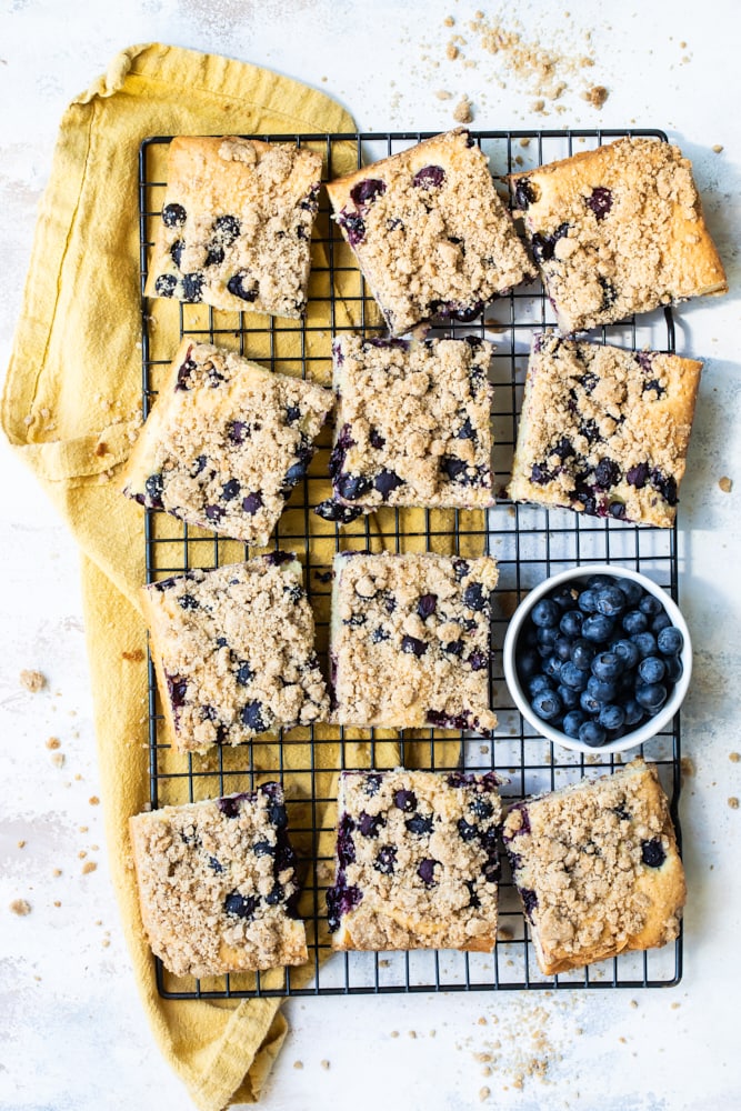 overhead view of Blueberry Crumb Cake slices on a wire rack