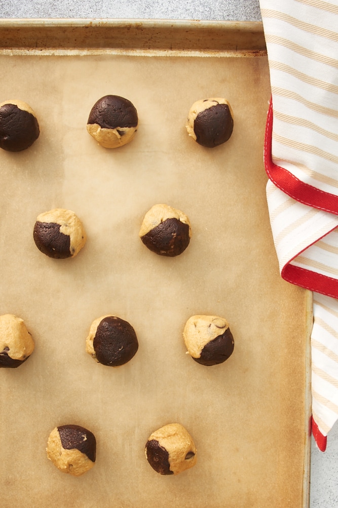 overhead view of Chocolate Peanut Butter Swirl Cookies dough on a baking pan