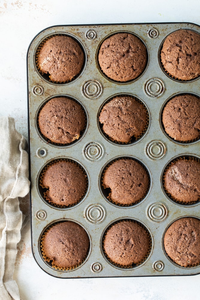 overhead view of baked Mexican Chocolate Cupcakes in a muffin pan