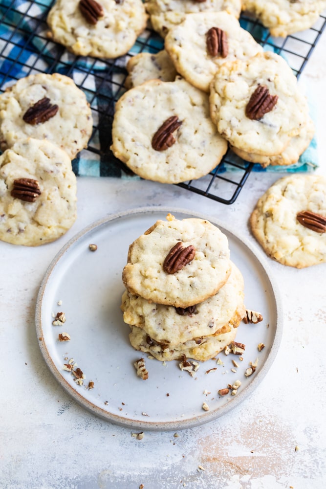 Potato Chip Cookies on a white plate and on a wire rack