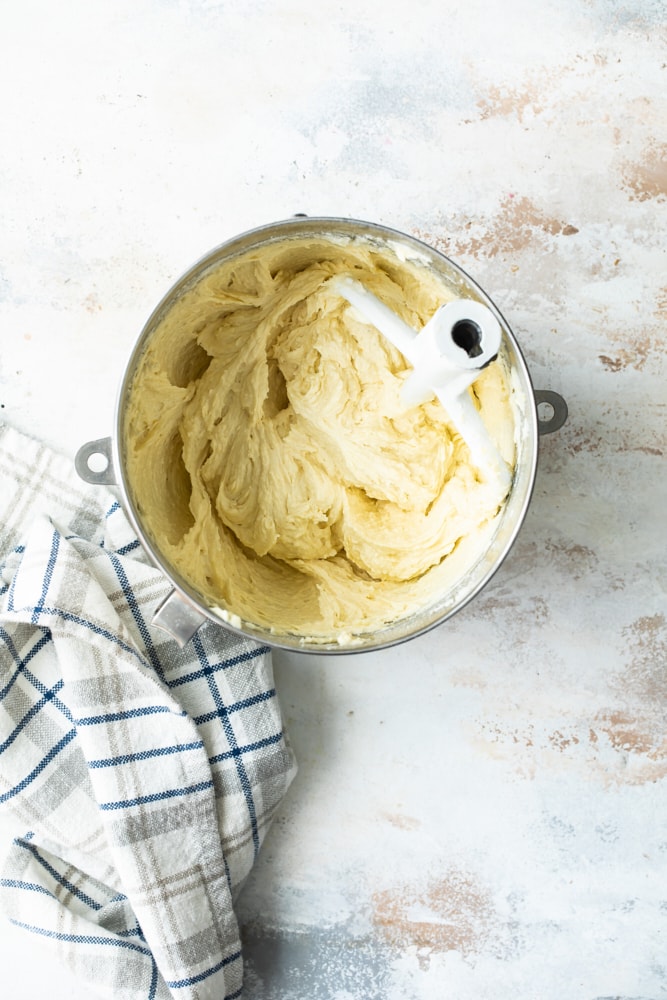 Overhead view of almond loaf batter in mixing bowl