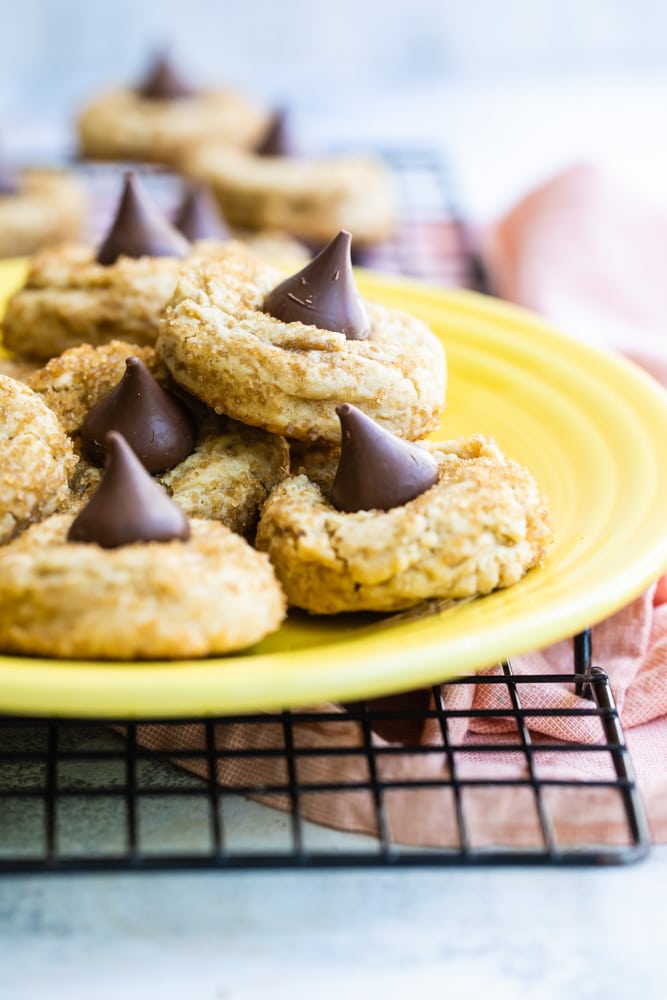 Chocolate Caramel Kiss Cookies on a yellow plate