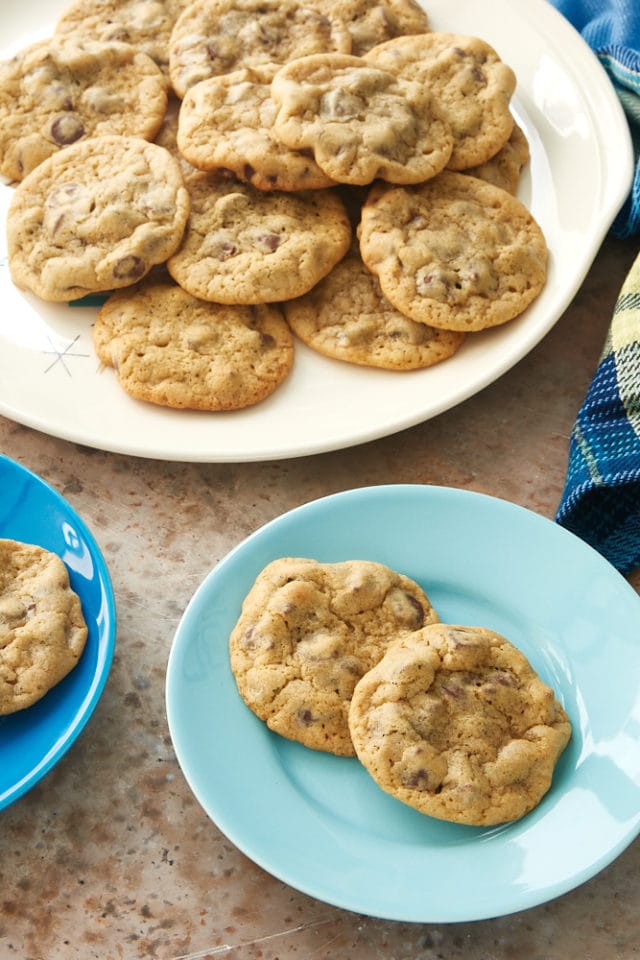 Greek Yogurt Chocolate Chip Cookies on blue plates and a white serving platter