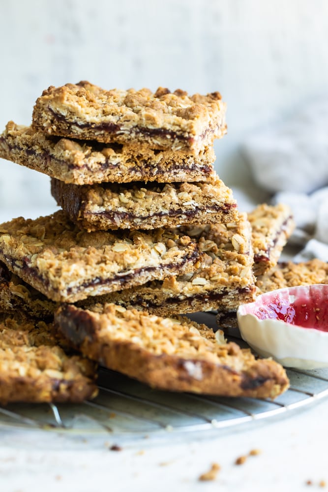 Raspberry Bars stacked on a wire rack