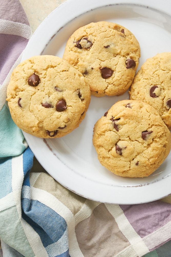 overhead view of chocolate chip cookies on a white plate