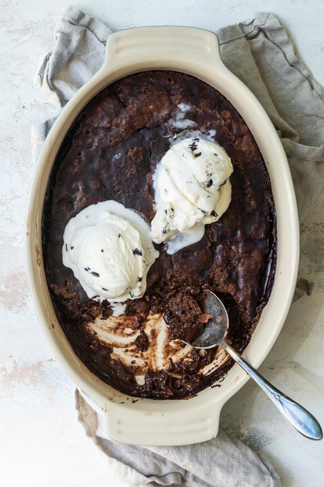 overhead view of Brownie Pudding Cake in an oval baking dish