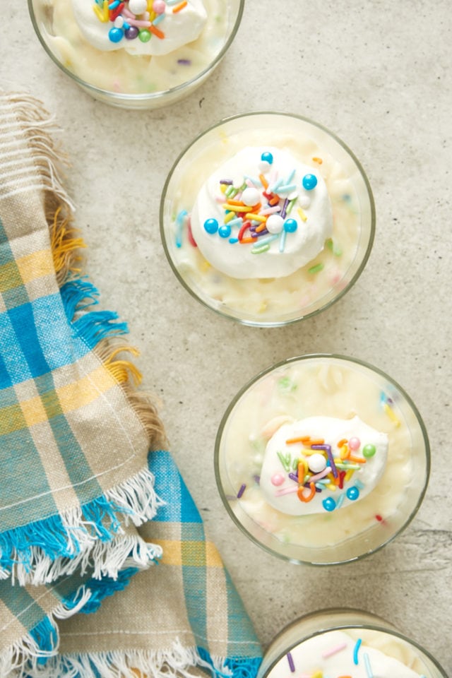 overhead view of Celebration No-Bake Cheesecakes on a gray surface