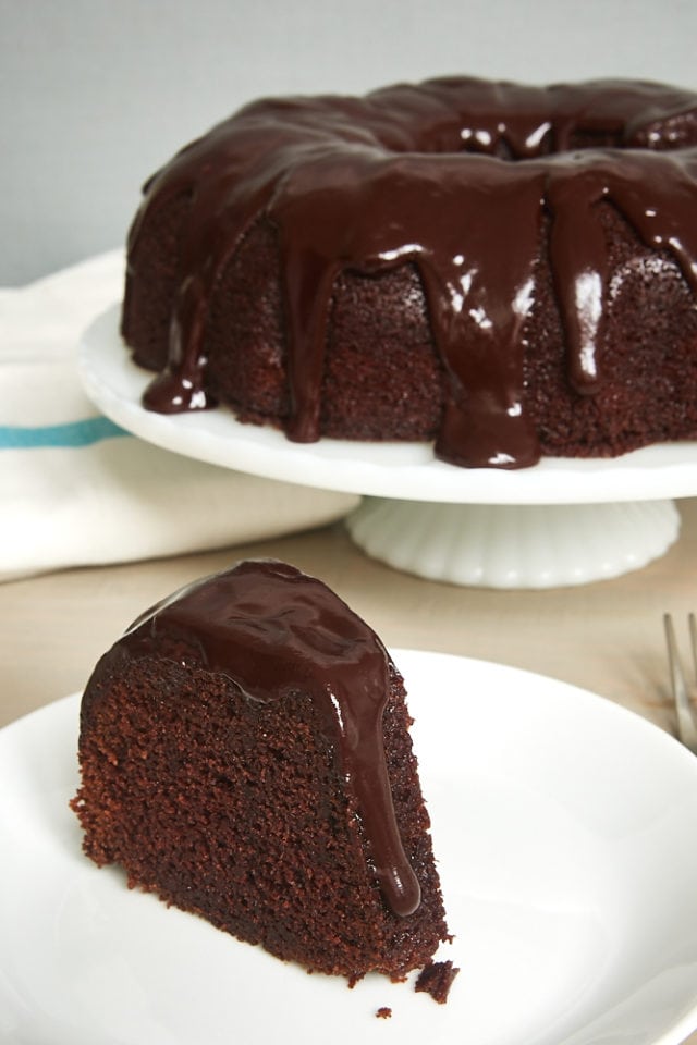 slice of Chocolate Sour Cream Bundt Cake on a white plate