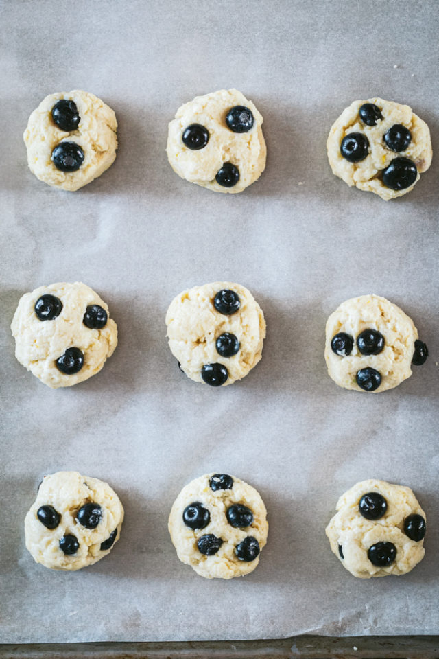 Overhead view of Blueberry Cookie dough on a parchment-lined baking sheet