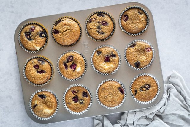 overhead view of Cherry Cheesecake Muffins in a muffin pan