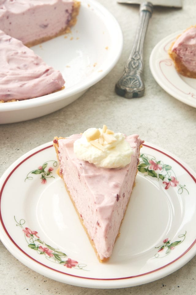 slice of Cherry Vanilla No-Bake Pie on a floral-rimmed white plate