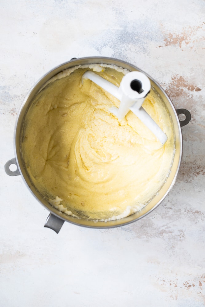 Overhead view of cake batter in mixing bowl