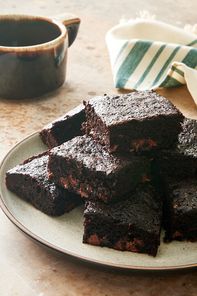 Double Chocolate Zucchini Brownies on a beige plate