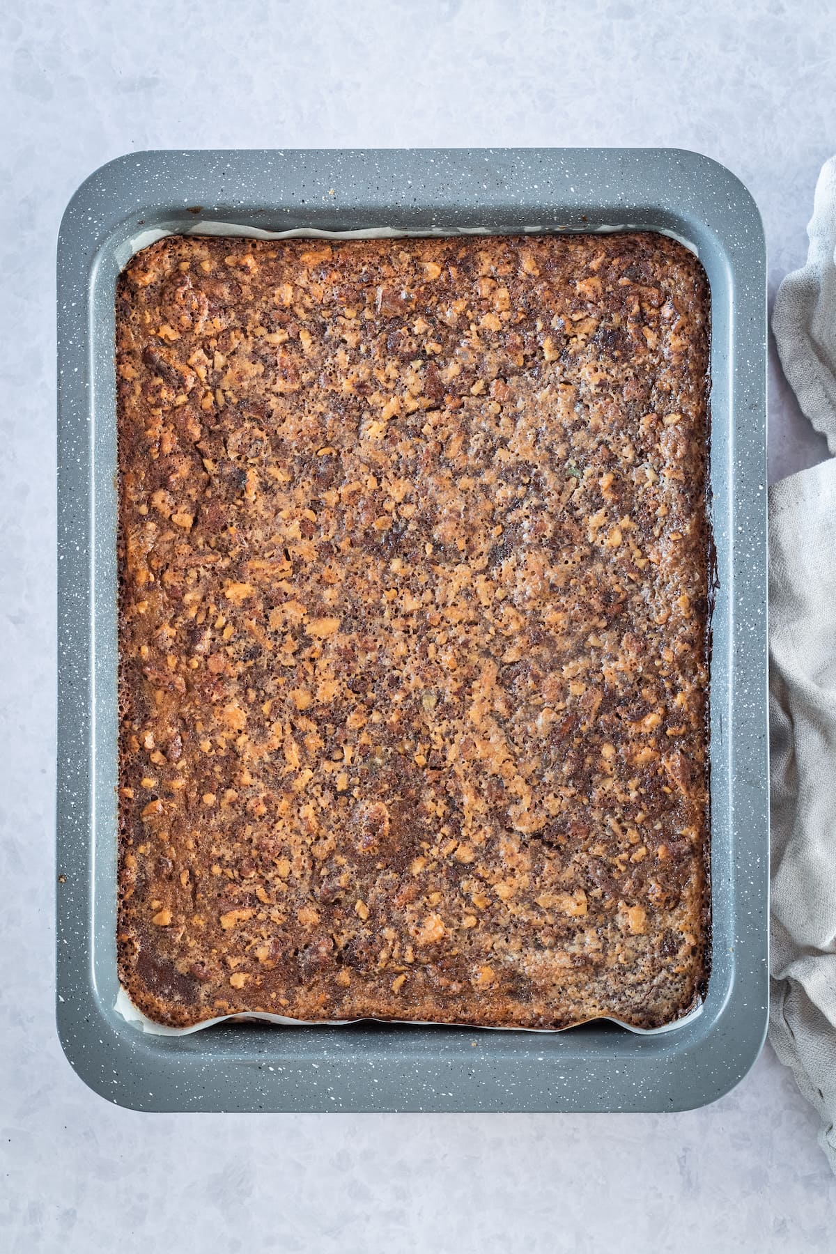 baking sheet of cooked pecan bars