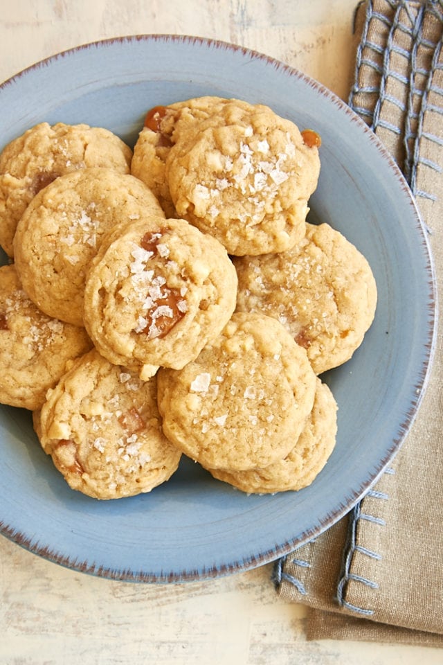 overhead view of Caramel Cashew Cookies on a blue plate