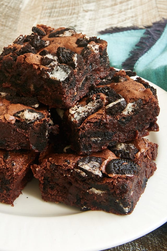 stack of Cookies and Cream Brownies on a white plate