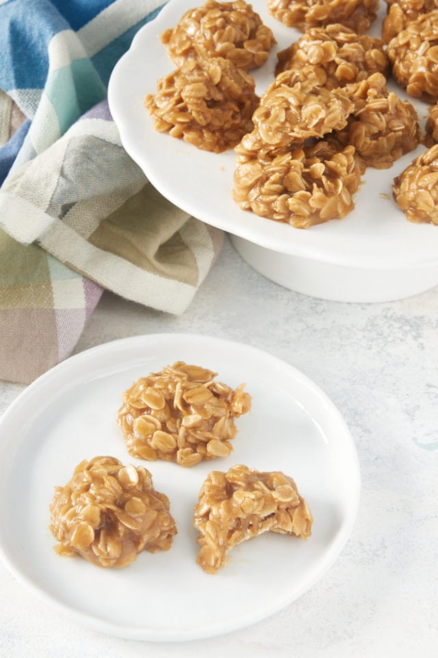 No-Bake Peanut Butter Oatmeal Cookies on a white plate and pedestal