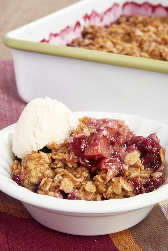 Summer Fruit Crisp and ice cream in a white bowl
