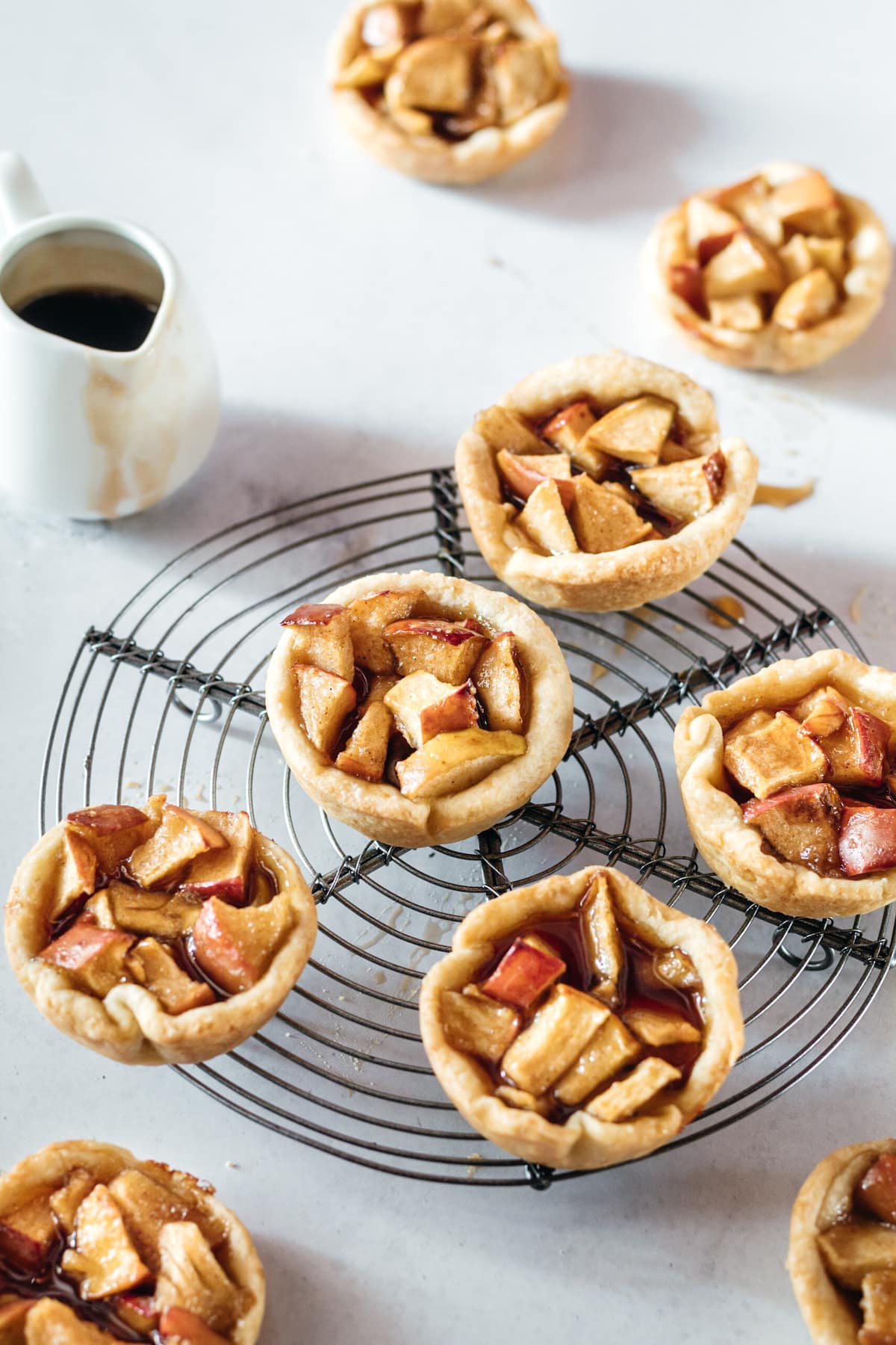 Mini Caramel Apple Pies on cooling rack