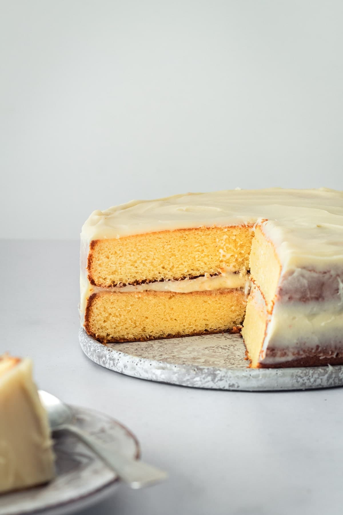 Caramel Cake with Caramel Cream Cheese Frosting with slices removed