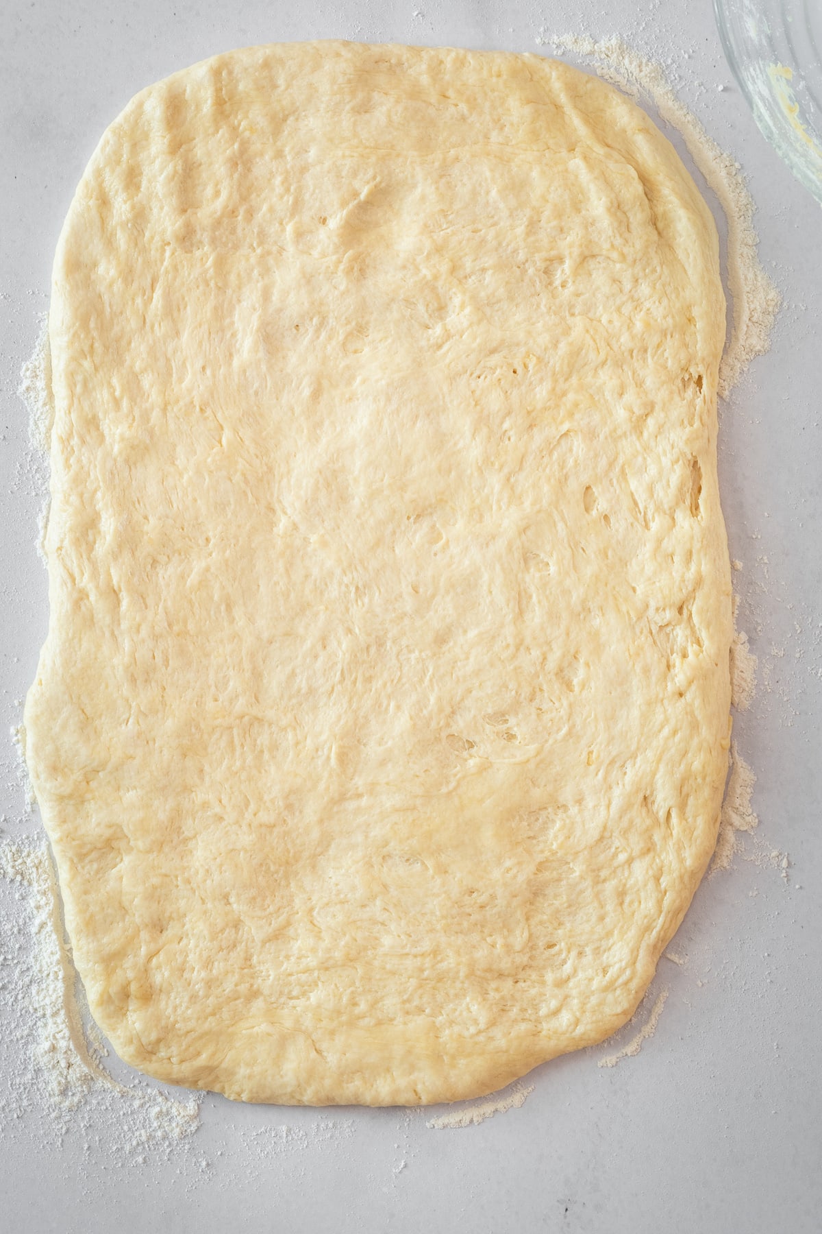 Overhead shot of rolled out biscuit dough