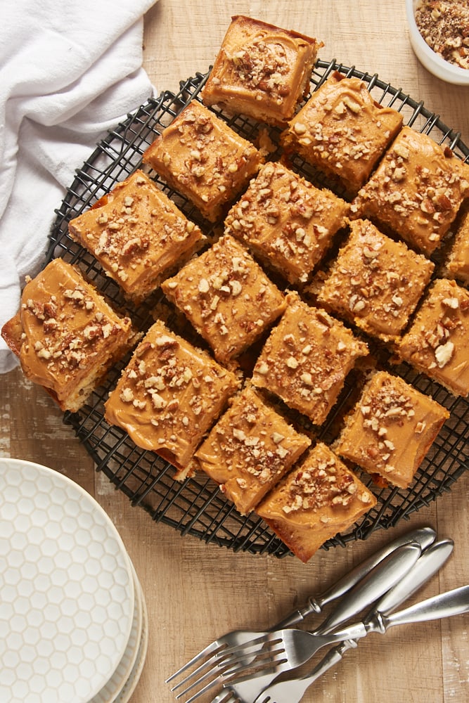 overhead view of frosted Brown Sugar Snack Cake on a wire rack