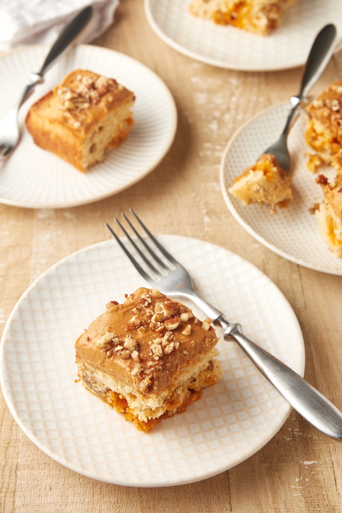 slices of Brown Sugar Cake on white and beige plates