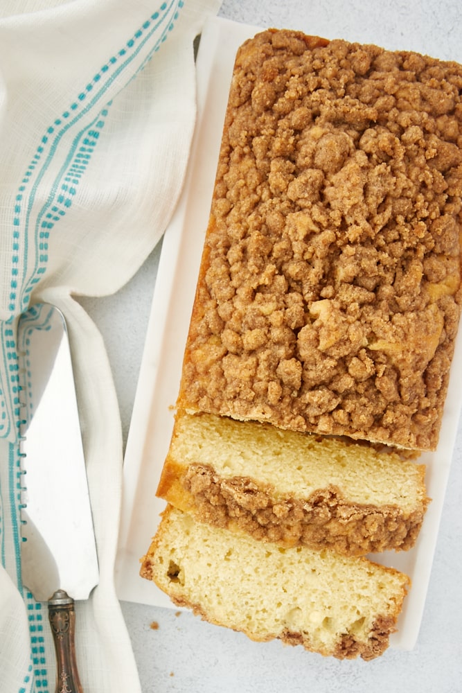 overhead view of Sour Cream Coffee Cake Loaf on a white tray