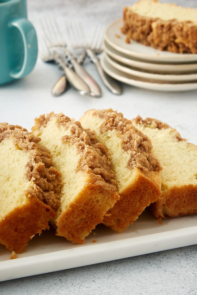 slices of Sour Cream Coffee Cake on a white tray