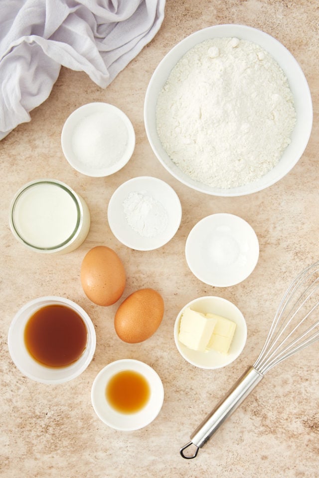 ingredients for Pancake Muffins, including flour, sugar, eggs, and maple syrup