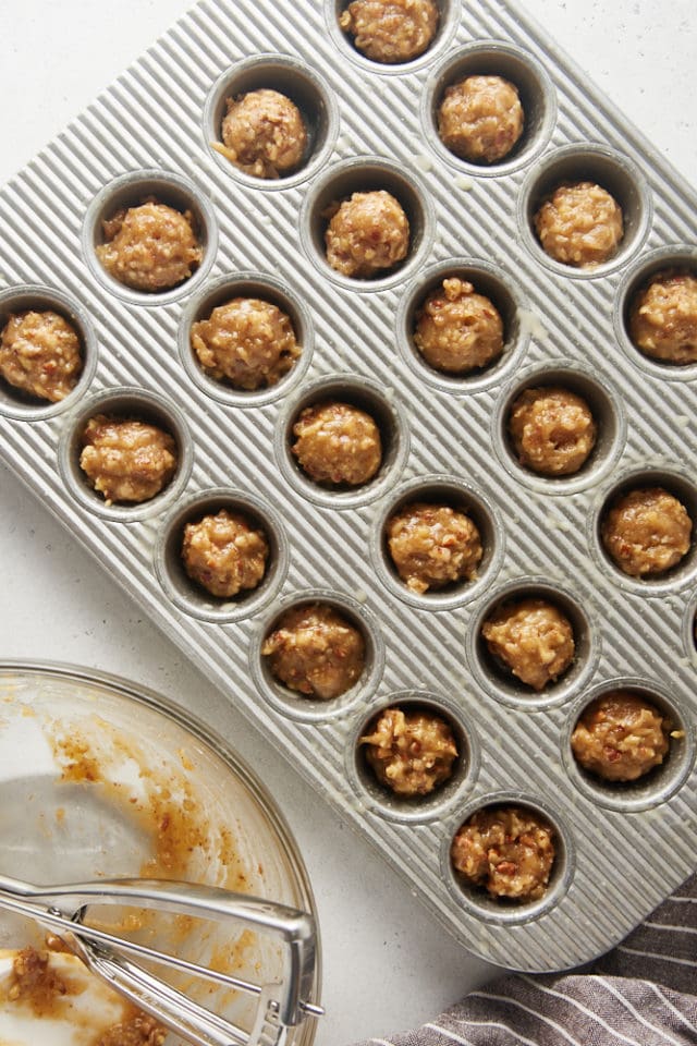 overhead view of Pecan Pie Cupcake batter in a mini muffin pan