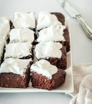 Platter of brownies topped with Swiss meringue