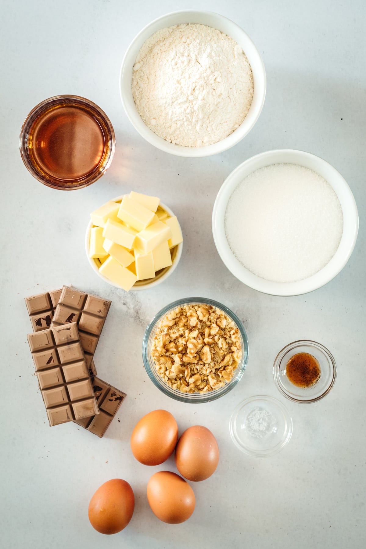 Overhead view of ingredients for chocolate pecan pie bars