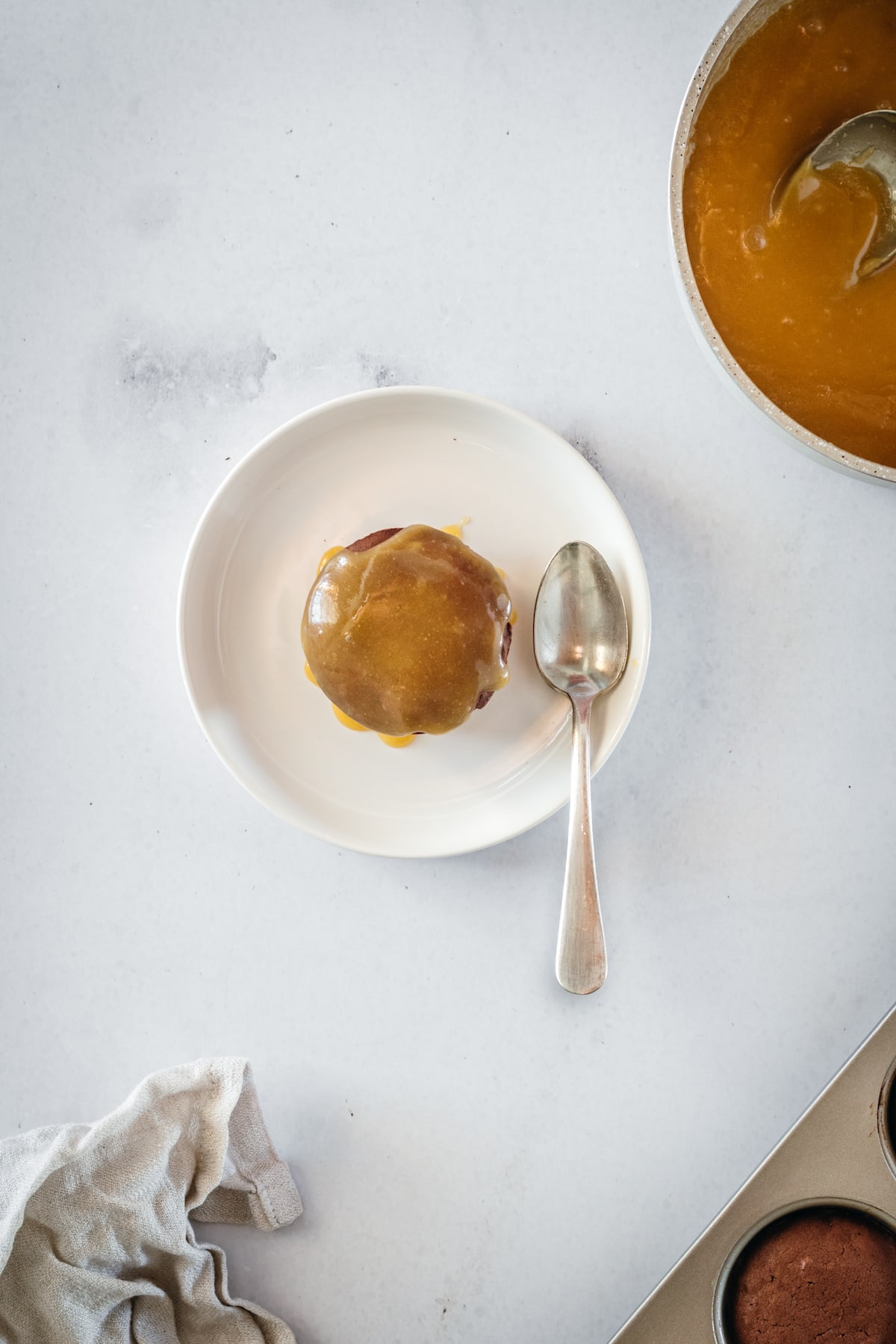 Overhead view of mini cake topped with butterscotch