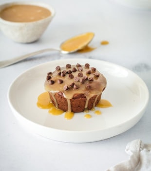 Plated mini chocolate pound cake glazed with butterscotch and topped with chocolate chips