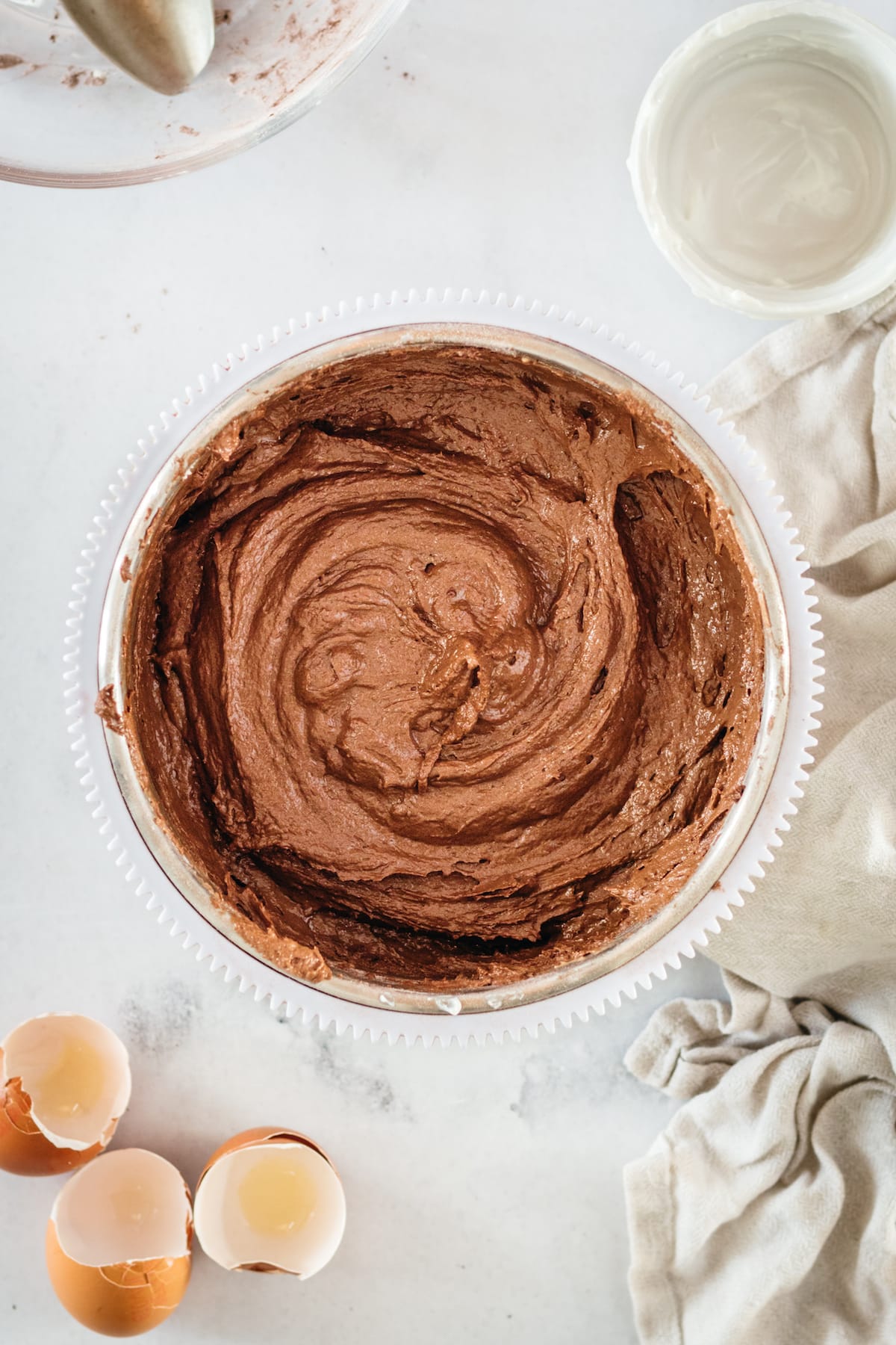 Overhead view of chocolate pound cake batter in mixing bowl