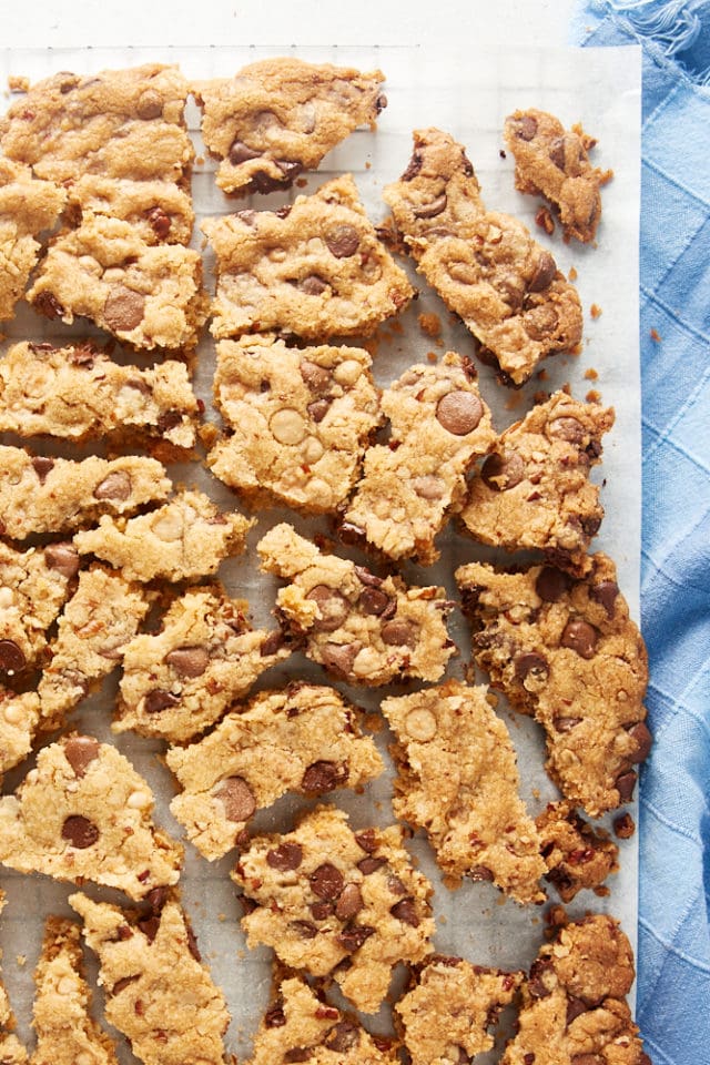 overhead view of Triple Chocolate Chip Cookie Brittle broken into individual pieces