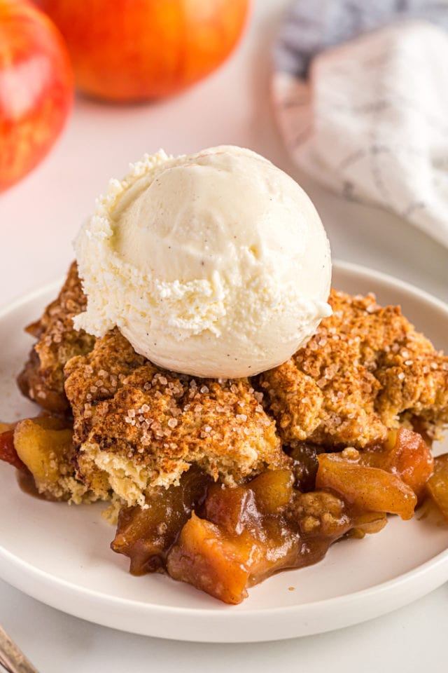 serving of apple cobbler on a white plate