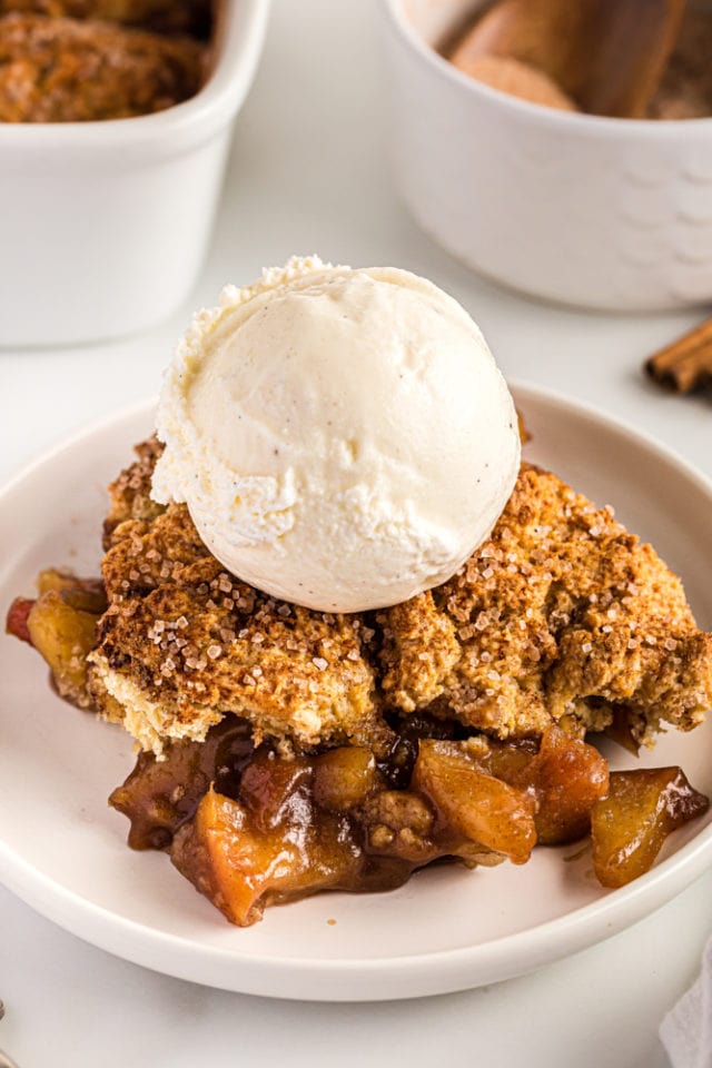 close-up of a serving of Brown Sugar Apple Cobbler topped with ice cream