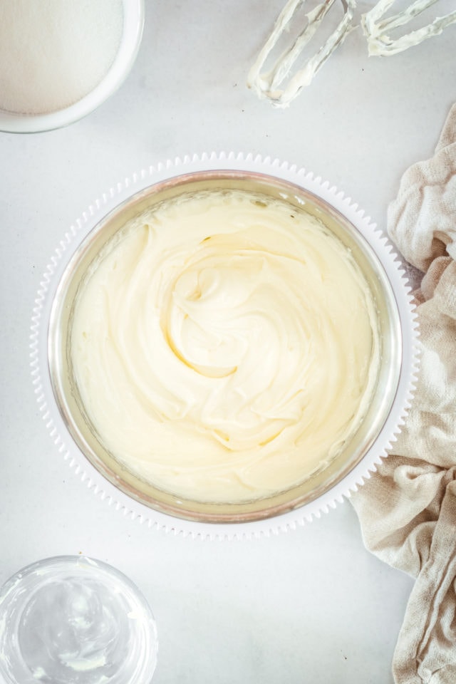 Overhead view of sweetened cream cheese in mixing bowl