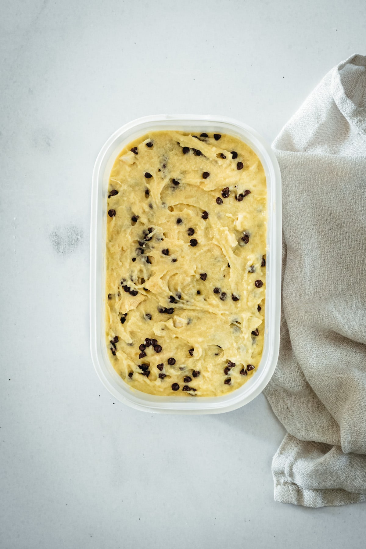 Overhead view of bread batter with chocolate chips