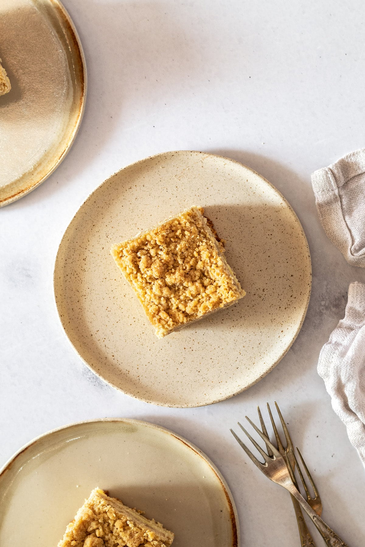 Overhead view of crumb cake on plates