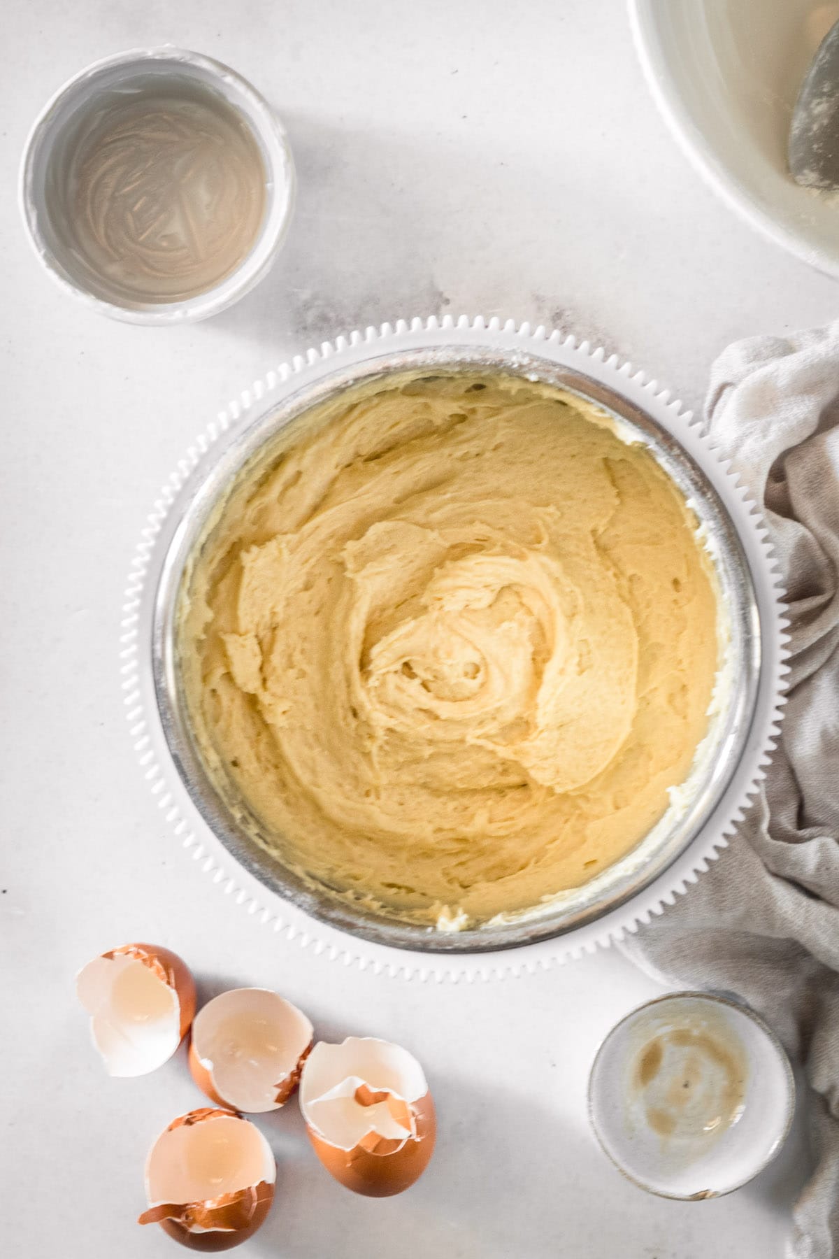 Overhead view of cake batter in mixing bowl