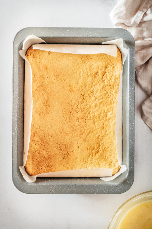 Overhead view of baked lemon bar crust in pan