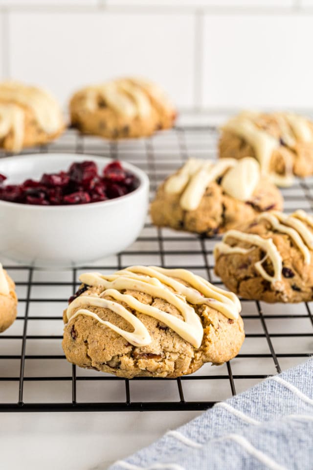 Oatmeal Cranberry Cookies scattered on a cooling rack