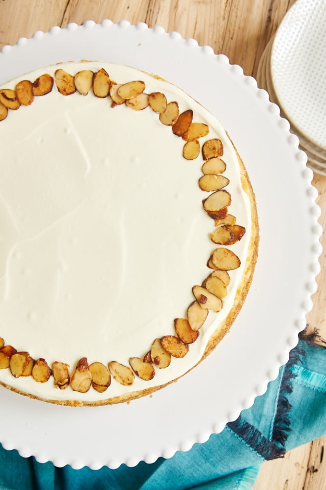 overhead view of Amaretto Cheesecake on a white pedestal