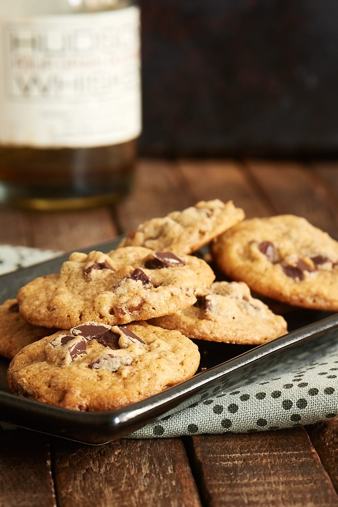 Bourbon Pecan Chocolate Chip Cookies on a dark gray tray