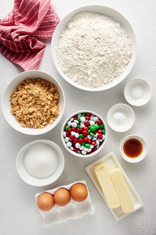 Overhead view of ingredients for Christmas M&M cookies.